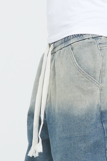SHORT EN DENIM DÉLAVÉ