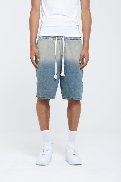 SHORT EN DENIM DÉLAVÉ